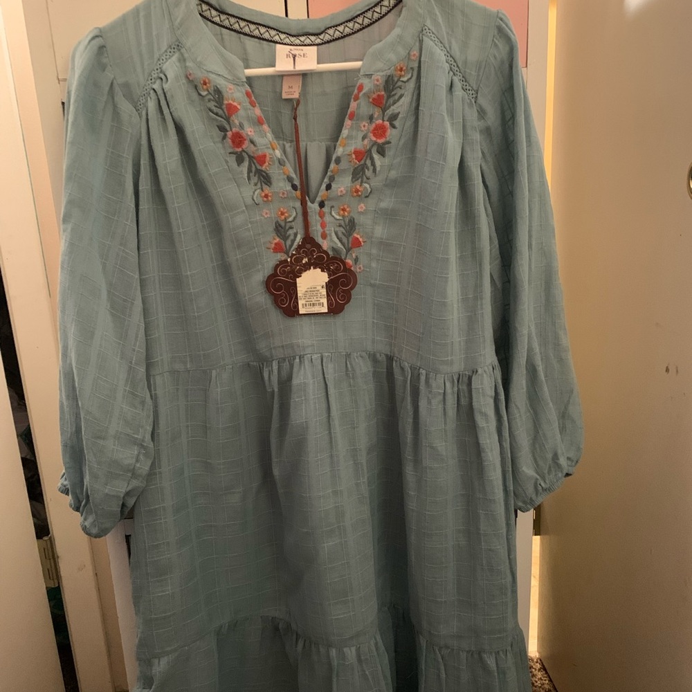 Know Rose blue dress with embroidered flowers around the neck.